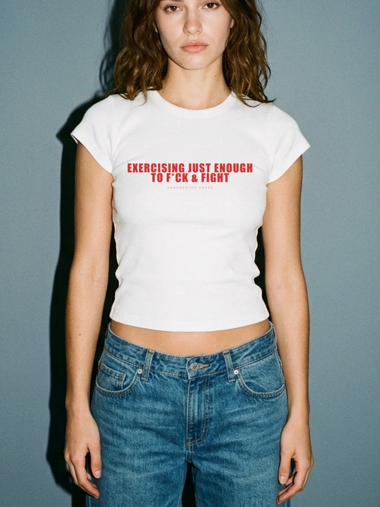 EXERCISING JUST ENOUGH — UNAPPROVED PRESS Baby Tee — Lookbook Editorial Bust Crop (Brunette Model)